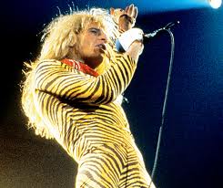 David Lee Roth sings while wearing 1980s-style body suit.